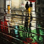 It's a rainy night in Toronto. A couple enters a parking garage after a night out in the city. Red, green and yellow reflect on the wet pavement.